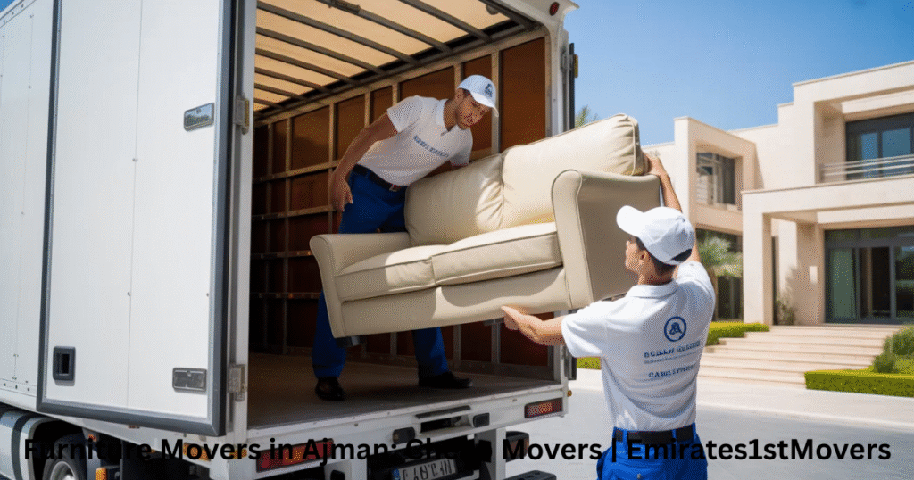 Furniture movers in Ajman team loading sofa into moving truck safely